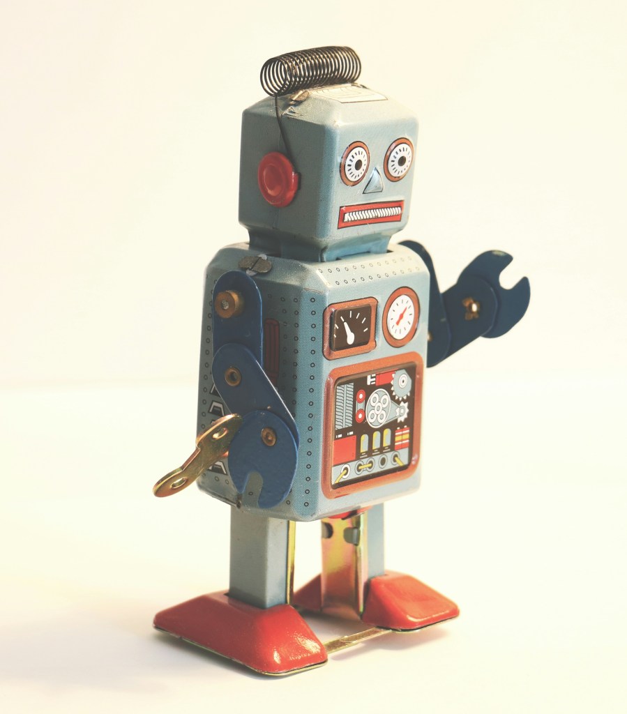 Toy Robot. Photo by Rock'n Roll Monkey on Unsplash